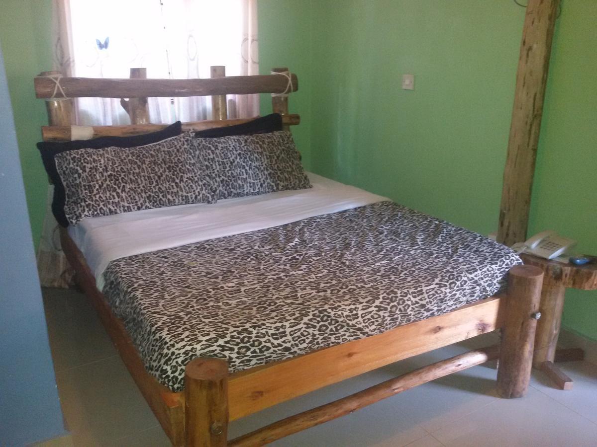 Unik Hotel Kireka Habitación foto
